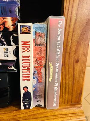 QUASER 4 HEAD VCR AND A GREAT ASSORTMENT OF VHS MOVIES