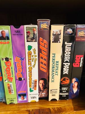 QUASER 4 HEAD VCR AND A GREAT ASSORTMENT OF VHS MOVIES
