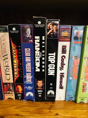 QUASER 4 HEAD VCR AND A GREAT ASSORTMENT OF VHS MOVIES
