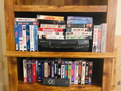 QUASER 4 HEAD VCR AND A GREAT ASSORTMENT OF VHS MOVIES