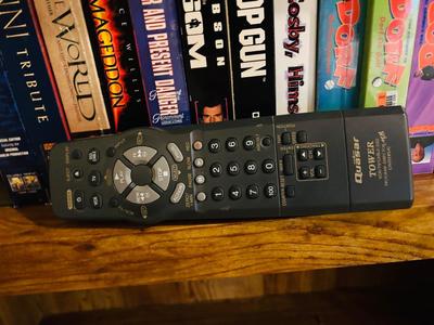 QUASER 4 HEAD VCR AND A GREAT ASSORTMENT OF VHS MOVIES