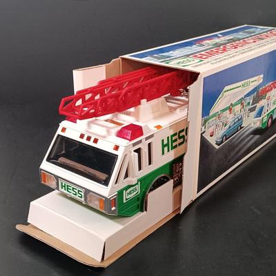 LOT 24: Miniature Hess Trucks, Texaco Havoline Racing Die-cast 1994 Bank, Mobil Collectible Toy Truck & More