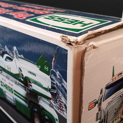 LOT 24: Miniature Hess Trucks, Texaco Havoline Racing Die-cast 1994 Bank, Mobil Collectible Toy Truck & More
