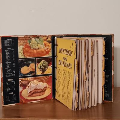LOT 139: Vintage Side Table with Cookbooks, Anchor Hocking Tartan Pitcher, Queen Mary Candle Holders & More
