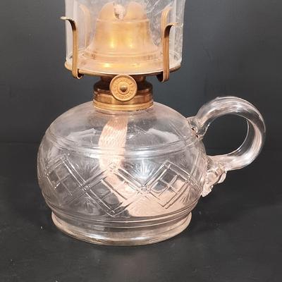 LOT 152: Oil Lamp with Unique Red and Clear Glass Shade & Set of (2) Finger Lamps