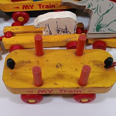 LOT 202: Vintage Montgomery School House 'My Train' Set with Strombecker Train Apart Wood Train and Romanian Made Wood Train