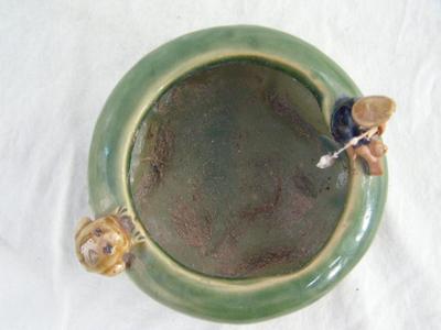 Small planter, ceramic, old man fishing & a frog on the rim.