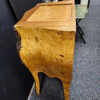 Sale Photo Thumbnail #346: Beautiful Burl wood and Ormolu Bombe commode nightstand chest.  Two drawers .  The marble top is not attached, it just sits atop the table.  This piece is in very nice condition.  Retail prices range from $550 to $1200.  
29.5 inches tall, 23.5 inches wid