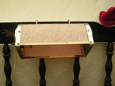 How 50s! Reading lamp, hangs on headboard. Adjustable.
