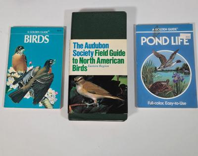 LOT 99L: Boy Scout Patches, Bird Books, Binoculars, Wooden Fish Shaped Rod Holder, Gone Fishing Sign, Sportsman Thermometer, Flyboys by...