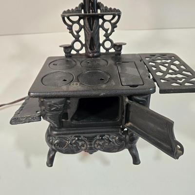 LOT 123L: Vintage Miniature Crescent Cast Iron Stove Table Lamp