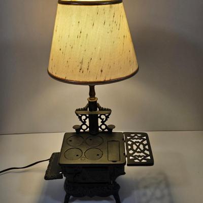 LOT 123L: Vintage Miniature Crescent Cast Iron Stove Table Lamp