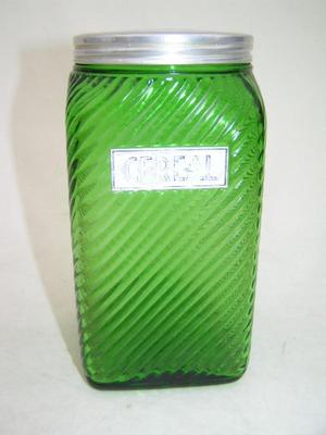 5th 1, square glass canister w/lid. About 7" tall