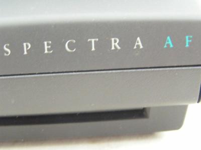 POLAROID Spectra AF instant picture camera, still has a film cartridge in it.