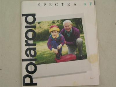 POLAROID Spectra AF instant picture camera, still has a film cartridge in it.