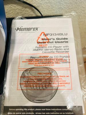 MEMOREX PORTABLE CD PLAYER WITH AM/FM STEREO AND CASSETTE PLAYER ALONG WITH SOME CD’s & CASSETTE