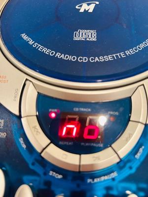 MEMOREX PORTABLE CD PLAYER WITH AM/FM STEREO AND CASSETTE PLAYER ALONG WITH SOME CD’s & CASSETTE