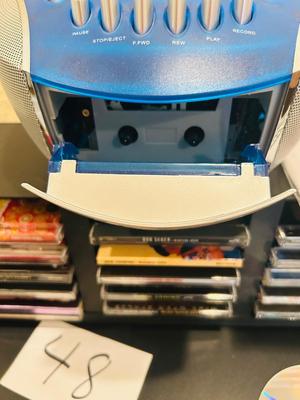 MEMOREX PORTABLE CD PLAYER WITH AM/FM STEREO AND CASSETTE PLAYER ALONG WITH SOME CD’s & CASSETTE