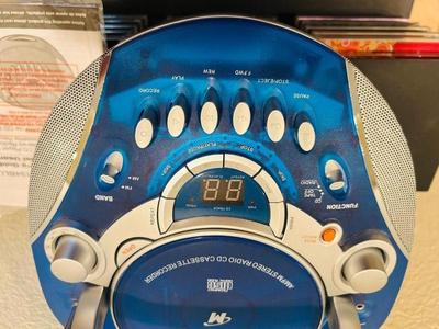 MEMOREX PORTABLE CD PLAYER WITH AM/FM STEREO AND CASSETTE PLAYER ALONG WITH SOME CD’s & CASSETTE