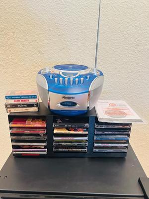 MEMOREX PORTABLE CD PLAYER WITH AM/FM STEREO AND CASSETTE PLAYER ALONG WITH SOME CD’s & CASSETTE