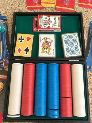 VINTAGE POKER CHIPS, DECKS OF CARDS AND A BUNCH OF DARTS