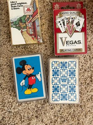 VINTAGE POKER CHIPS, DECKS OF CARDS AND A BUNCH OF DARTS