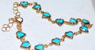 12 Blue Hearts Bracelet with Gold Tone Surrounds & Chain 7" Circumference
