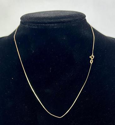 Lot 27: 14k Gold Necklace - 1g