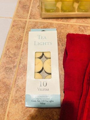 COOKBOOKS, CANDLES, AND DISH TOWELS