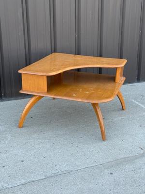Sale Photo Thumbnail #25: Z3-Heywood Wakefield Corner Table

There is no makers mark on the bottom of this corner table.
Please see photos for damage, this piece will require some TLC.