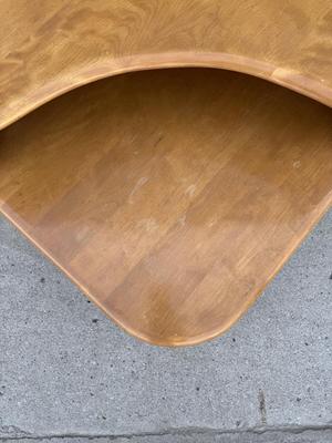 Sale Photo Thumbnail #27: Z3-Heywood Wakefield Corner Table

There is no makers mark on the bottom of this corner table.
Please see photos for damage, this piece will require some TLC.