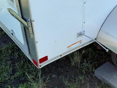 Sale Photo Thumbnail #50: Z4-Enclosed Trailer with hitch lock and padlock for door