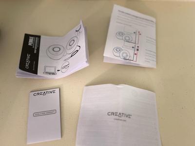 iPOD SHUFFLE 512 MB AND CREATIVE PEBBLE MODERN 2.0 USB DESKTOP SPEAKERS