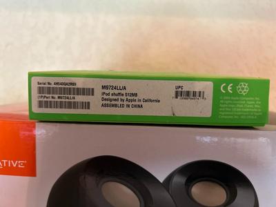 iPOD SHUFFLE 512 MB AND CREATIVE PEBBLE MODERN 2.0 USB DESKTOP SPEAKERS