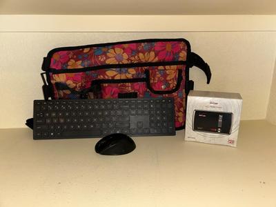 HP WIRELESS KEYBOARD AND MOUSE WITH A BAG THAT CAN ATTACH TO A MOBILITY WALKER