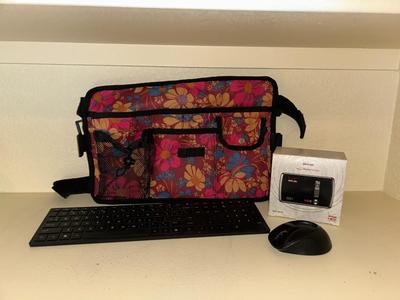 HP WIRELESS KEYBOARD AND MOUSE WITH A BAG THAT CAN ATTACH TO A MOBILITY WALKER