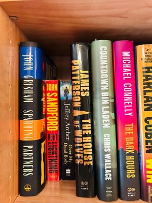 SEVERAL NICE HARDBACK NOVELS AND A DICTIONARY