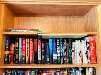 SEVERAL NICE HARDBACK NOVELS AND A DICTIONARY