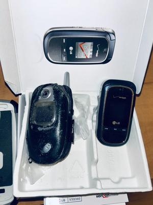 SAMSUNG GALAXY S4 CELL PHONE W/OTTERBOX AND 2 FLIP PHONES