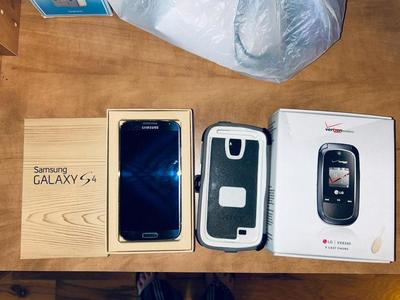 SAMSUNG GALAXY S4 CELL PHONE W/OTTERBOX AND 2 FLIP PHONES