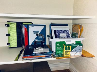 AN ARRAY OF DIFFERENT PAPER AND, LABELS SLEEVES, HOLE PUNCH AND OTHER ITEMS