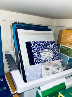 AN ARRAY OF DIFFERENT PAPER AND, LABELS SLEEVES, HOLE PUNCH AND OTHER ITEMS