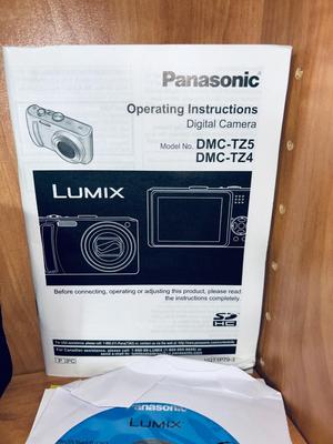 PANASONIC LUMIX DMC-TZ4 DIGITAL CAMERA WITH EXTRAS