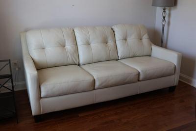 Ashley Furniture Cream Faux Leather Sleeper Sofa