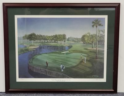 LOT 100: Framed Artwork of The 16th Hole of The Players Stadium Course at TPC Sawgrass in Ponte Vedra, Florida.