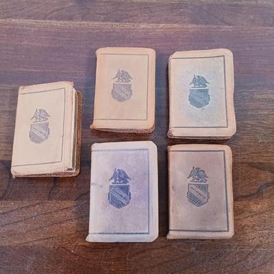 LOT 7: Set of (5) Early 20th Century Leather Bound Miniature 2" Books, Six Volumes of the 1904 Master Pieces of Humor & More