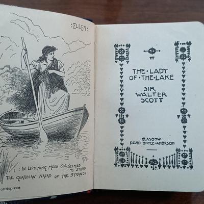 LOT 7: Set of (5) Early 20th Century Leather Bound Miniature 2" Books, Six Volumes of the 1904 Master Pieces of Humor & More