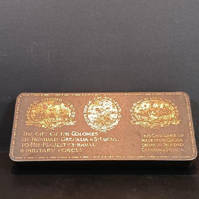 LOT 114: Antique Metal Cash Boxes with Gift of the Colonies Chocolate Tin