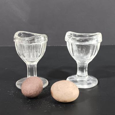LOT 120: Milk Glass Eggs, Eye Wash Cups, Miniature Bisque Dogs, Porcelain Cigarette Holder Boots & More