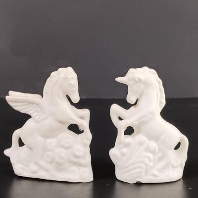 LOT 120: Milk Glass Eggs, Eye Wash Cups, Miniature Bisque Dogs, Porcelain Cigarette Holder Boots & More